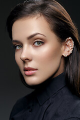 Image showing Beautiful girl with pearls on ear