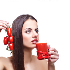 Image showing girl with cherry tomatoes and juice 