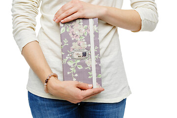 Image showing beautiful scrapbooking folder in woman hand