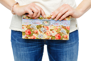Image showing beautiful scrapbooking folder in woman hand