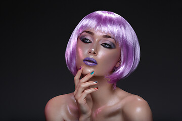 Image showing Beautiful girl in purple wig