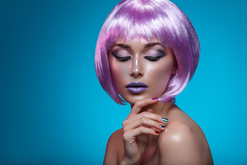 Image showing Beautiful girl in purple wig