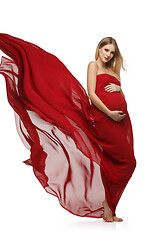 Image showing Pregnant girl in red dress