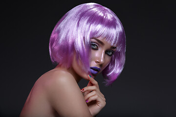 Image showing Beautiful girl in purple wig