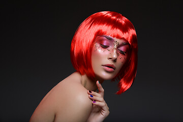 Image showing Beautiful girl in red wig