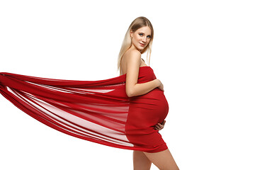 Image showing Pregnant girl in red dress