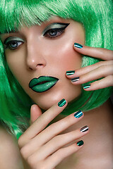 Image showing beautiful girl in green wig