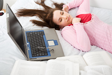 Image showing Sleeping caucasian female student