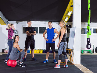 Image showing athletes getting instructions from trainer