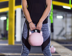 Image showing woman exercise with fitness kettlebell