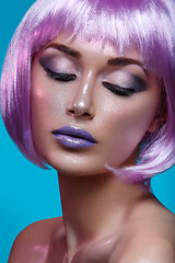 Image showing Beautiful girl in purple wig