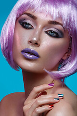 Image showing Beautiful girl in purple wig