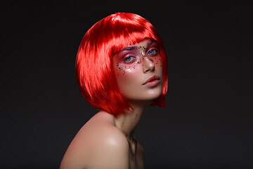 Image showing Beautiful girl in red wig