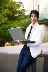 Image showing Asian college student with laptop