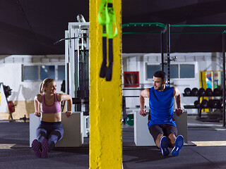 Image showing athletes working out their arms