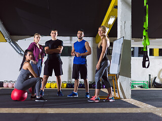 Image showing athletes getting instructions from trainer