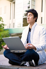 Image showing Asian college student meditation