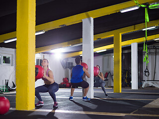 Image showing young athletes working out with medical ball