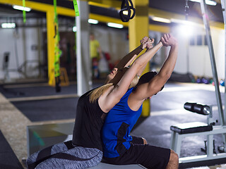 Image showing athletes working out their arms