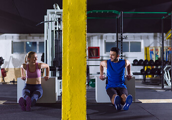 Image showing athletes working out their arms