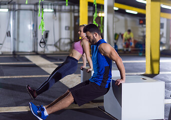 Image showing athletes working out their arms