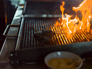 Image showing beef steak on the grill