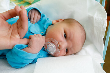 Image showing Newborn baby infant in the hospital