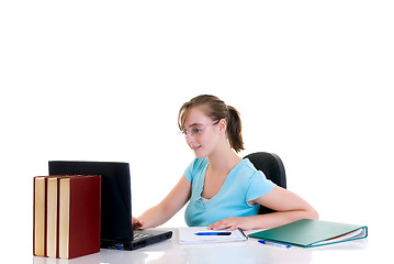 Image showing Teenager girl on desk