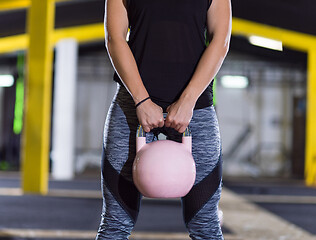 Image showing woman exercise with fitness kettlebell