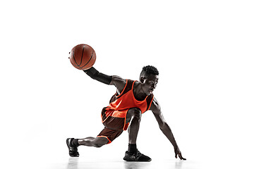 Image showing Full length portrait of a basketball player with ball