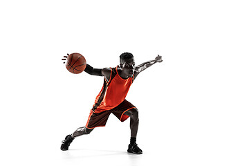 Image showing Full length portrait of a basketball player with ball