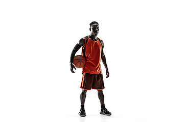 Image showing Full length portrait of a basketball player with ball