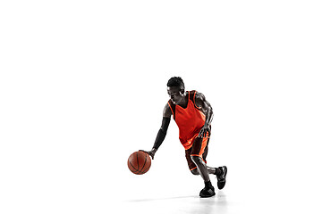 Image showing Full length portrait of a basketball player with ball