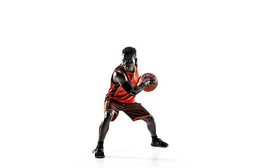 Image showing Full length portrait of a basketball player with ball