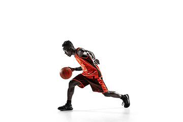 Image showing Full length portrait of a basketball player with ball