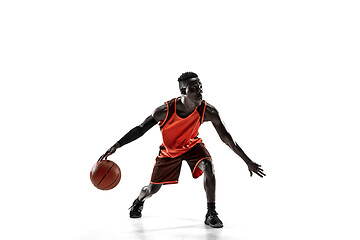 Image showing Full length portrait of a basketball player with ball