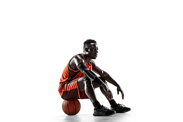 Image showing Full length portrait of a basketball player with ball