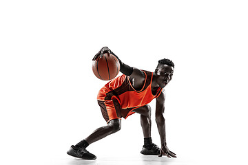 Image showing Full length portrait of a basketball player with ball