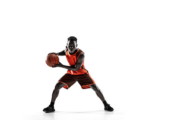 Image showing Full length portrait of a basketball player with ball