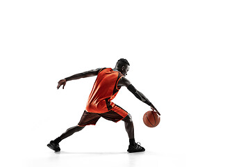 Image showing Full length portrait of a basketball player with ball