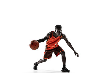 Image showing Full length portrait of a basketball player with ball