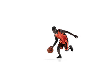 Image showing Full length portrait of a basketball player with ball