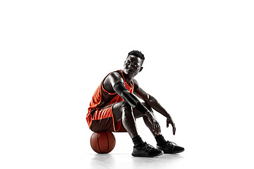 Image showing Full length portrait of a basketball player with ball