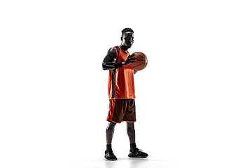 Image showing Full length portrait of a basketball player with ball