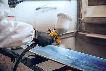 Image showing Master painter in a factory