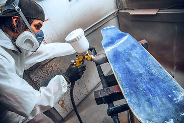 Image showing Master painter in a factory