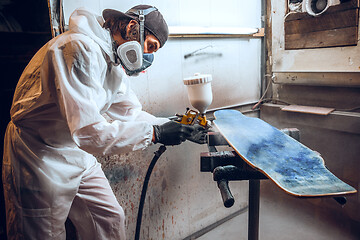 Image showing Master painter in a factory