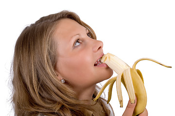 Image showing Portrait of the young woman with a banana. Isolated