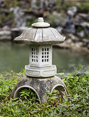 Image showing Stone buddhist lamp in japanese garden