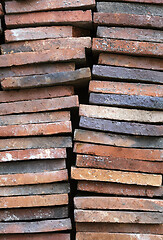 Image showing Background of old clay tiles in a pile